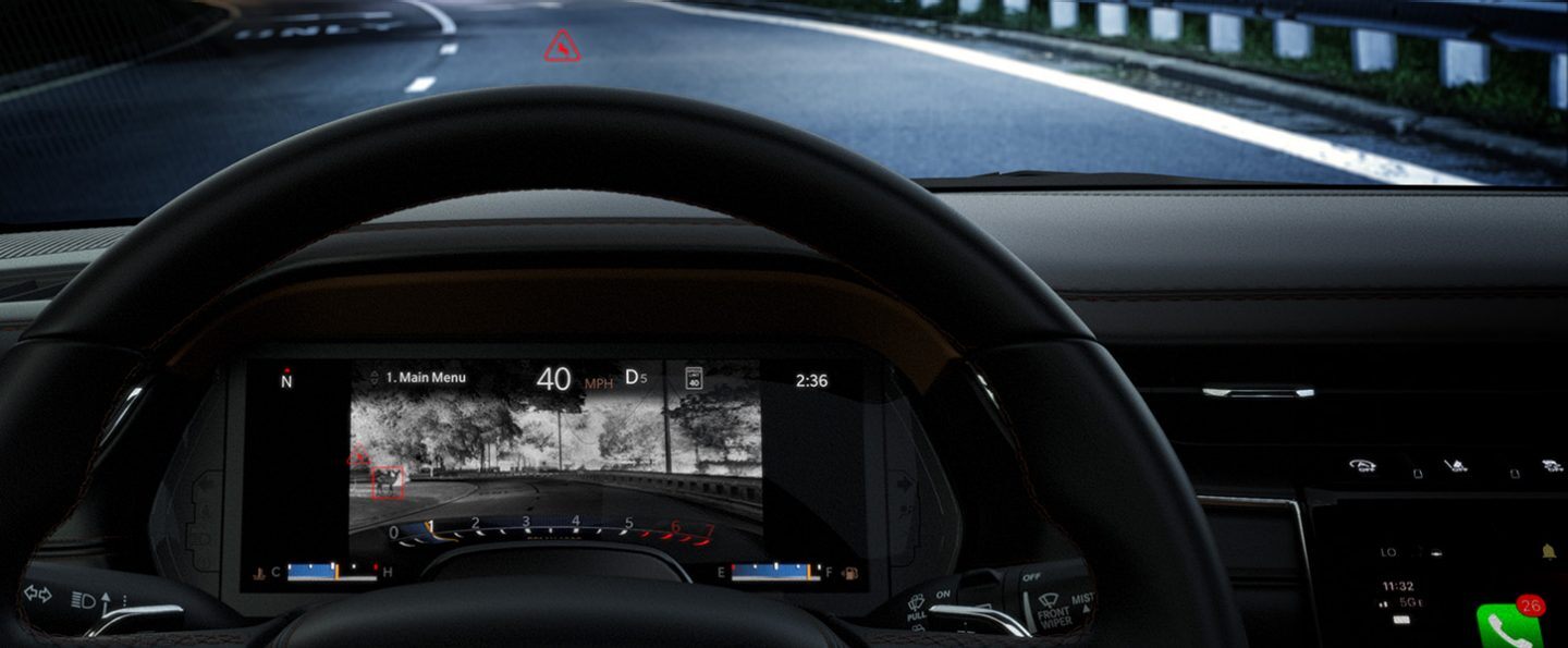The Driver Information Digital Cluster inside the 2022 Jeep Grand Cherokee presenting the night vision camera display.